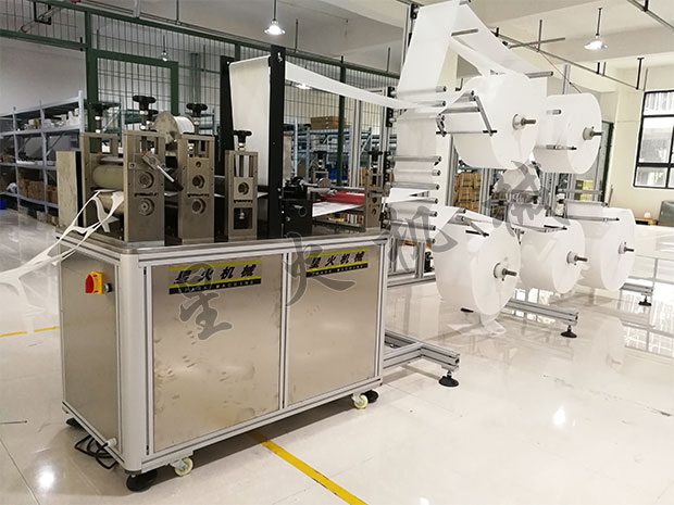 星火kn95口罩自動打片機設備操作中實拍